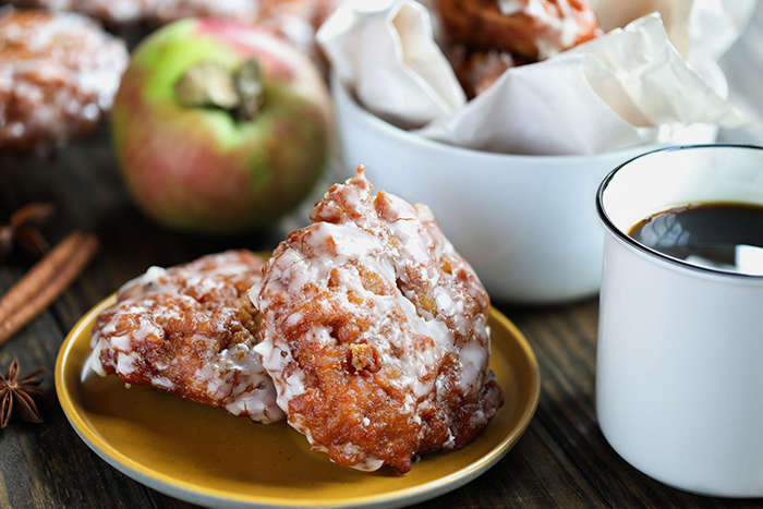 Glazed apple fritters and coffee at an Apple Hill bakery